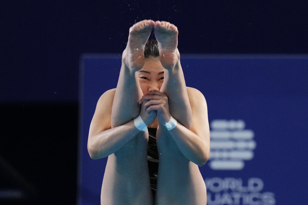 QATAR — ‘Please, please, please give me a good score’: Kim Suji of South Korea competes during the women's 3m springboard diving semifinal at the World Aquatics Championships in Doha, Qatar, Friday, Feb. 9, 2024.Photo: Hassan Ammar/AP